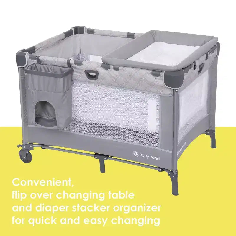 Box per neonati Baby Trend Lullaby Nursery Suite EZ-Fold con sdraietta portatile a dondolo - motivo a quadri Madrid: Cappottina, Culla, Ruote bloccabili, Vibrazione
