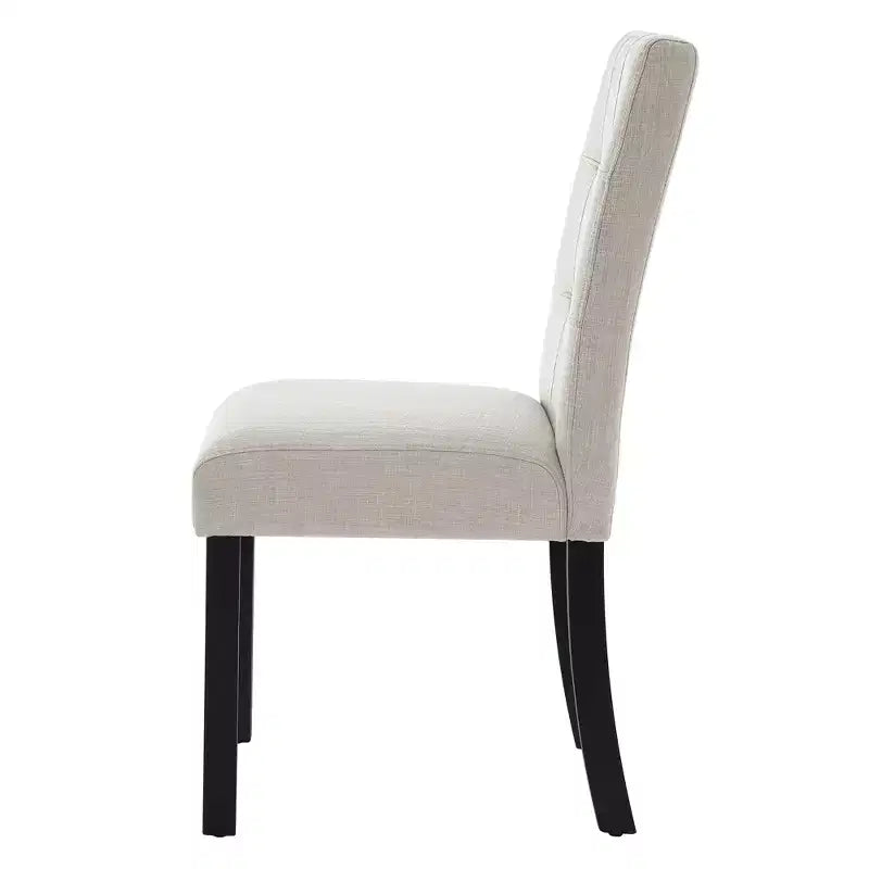 Set di 4 moderne sedie da pranzo trapuntate con gambe in legno di gomma e seduta imbottita