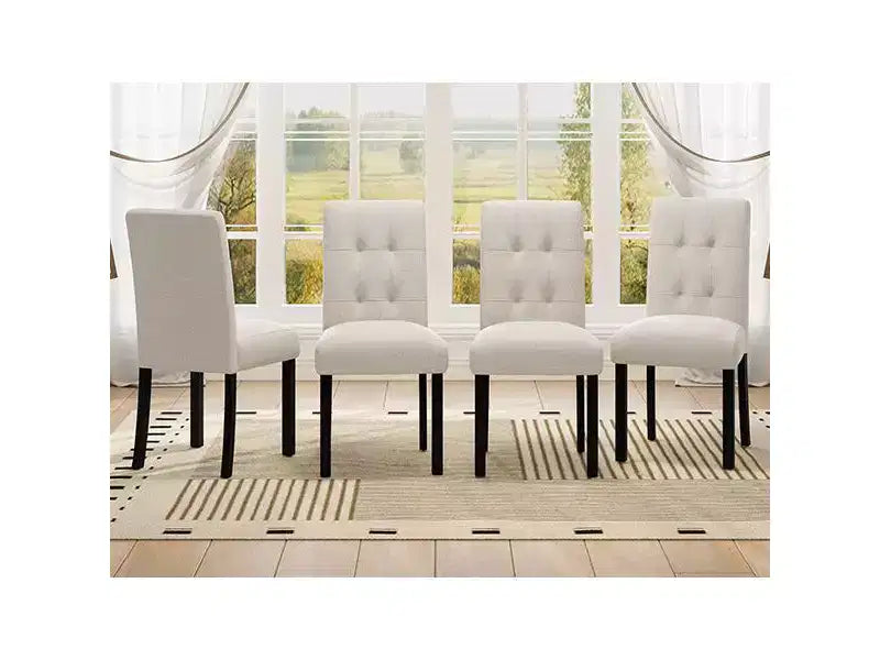 Set di 4 moderne sedie da pranzo trapuntate con gambe in legno di gomma e seduta imbottita