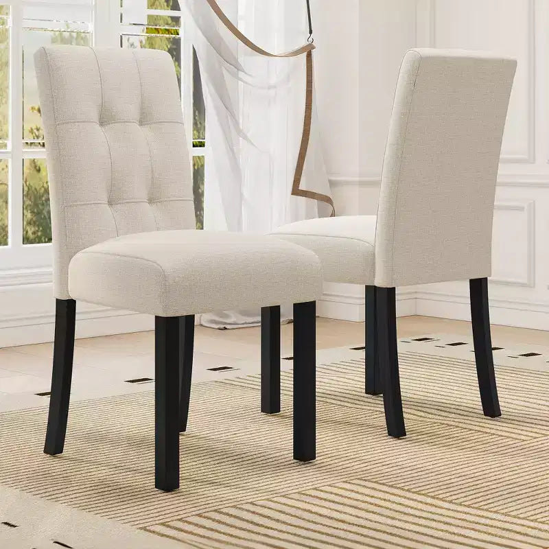 Set di 4 moderne sedie da pranzo trapuntate con gambe in legno di gomma e seduta imbottita