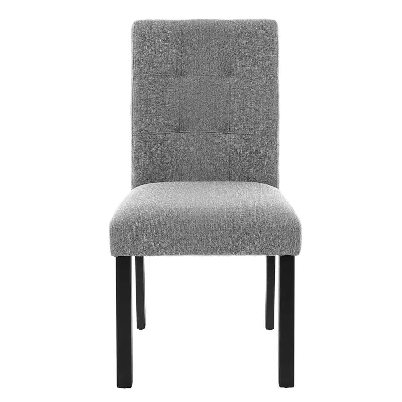 Set di 4 moderne sedie da pranzo trapuntate con gambe in legno di gomma e seduta imbottita