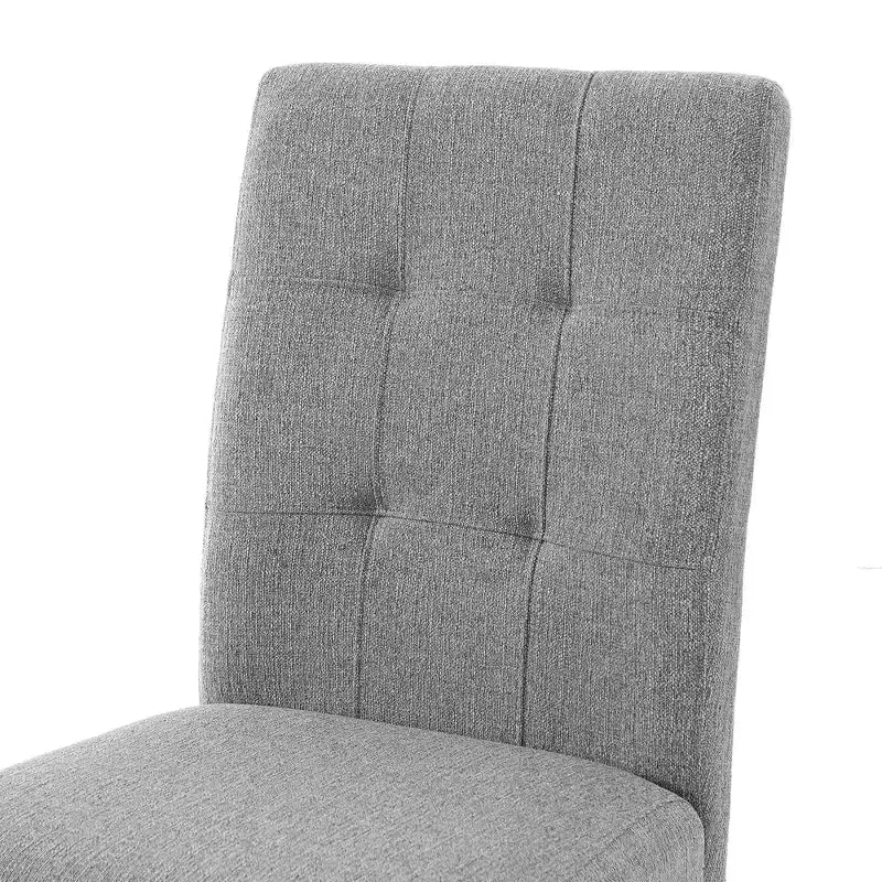 Set di 4 moderne sedie da pranzo trapuntate con gambe in legno di gomma e seduta imbottita