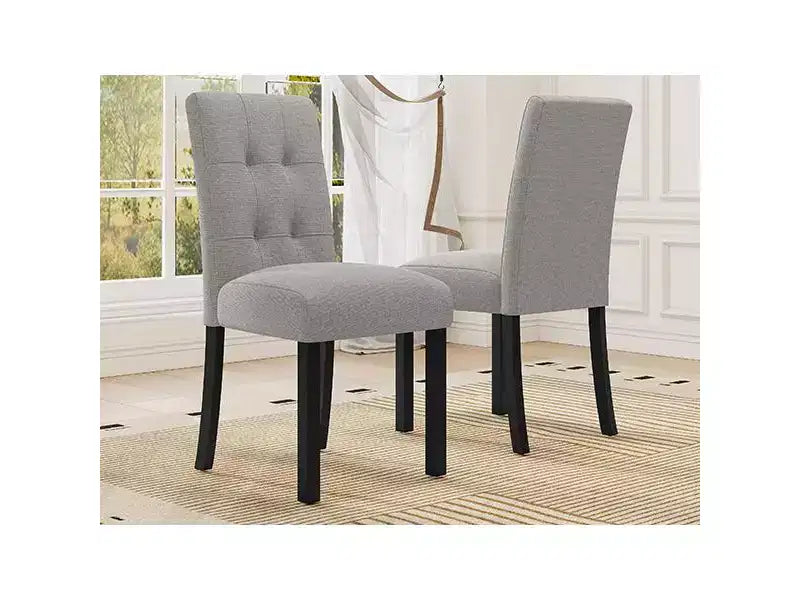Set di 4 moderne sedie da pranzo trapuntate con gambe in legno di gomma e seduta imbottita