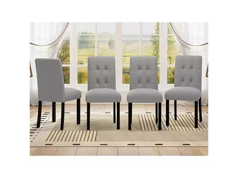 Set di 4 moderne sedie da pranzo trapuntate con gambe in legno di gomma e seduta imbottita