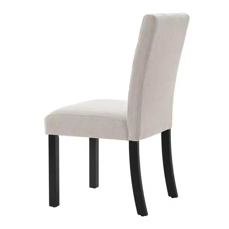 Set di 4 moderne sedie da pranzo trapuntate con gambe in legno di gomma e seduta imbottita