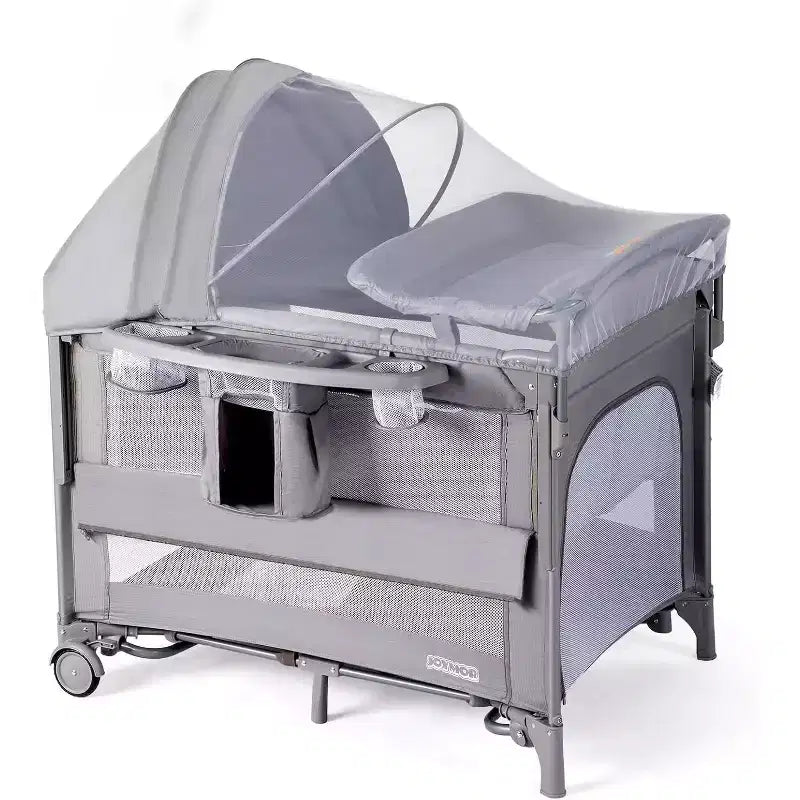 JOYMOR 9 in 1 Bedside Bassinet with Changing Table, Pack and Play with Bassinet, Convert to Rocking Baby Bed with Electric Music Center