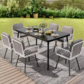7-Piece Outdoor Patio Dining Set, 59x35 Iron Frame Table with Black Tempered Glass Top, 6 All-Weather PE Wicker Chairs with Gray Cushions