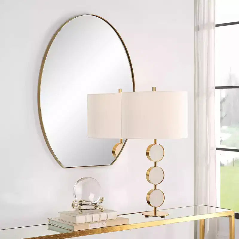 Specchio da parete ovale Cabell Uttermost in ottone spazzolato, 24 x 32